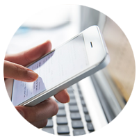 person using mobile phone to check market trends