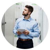 Man walking through server room