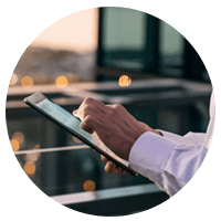 Close up of hands on tablet outside