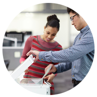 Business professionals using a HP Laserjet Pro MFP M277n.