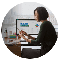 Microsoft Dynamics woman using multiple devices
