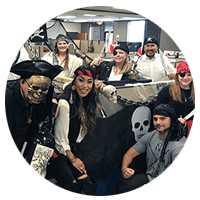 Insight team members dressed as pirates for Halloween