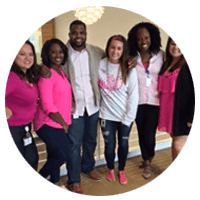 Group of Insight teammates celebrate Insight's own World Wide Fuchsia Day