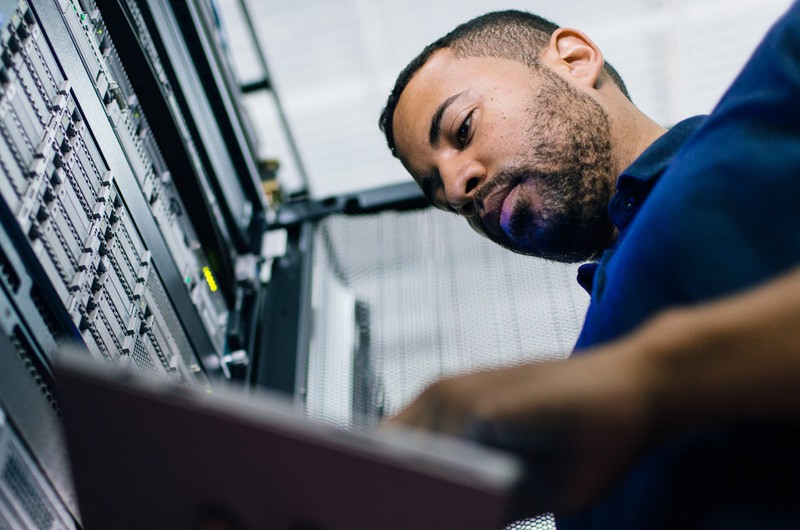 Gartner analysts provide insight that business leaders rely on. IT executive working in data center solving problem