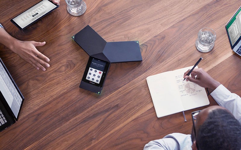 RealPresence Trio extend the capabilities of your conference phone Polycom RealPresence Trio product on conference table