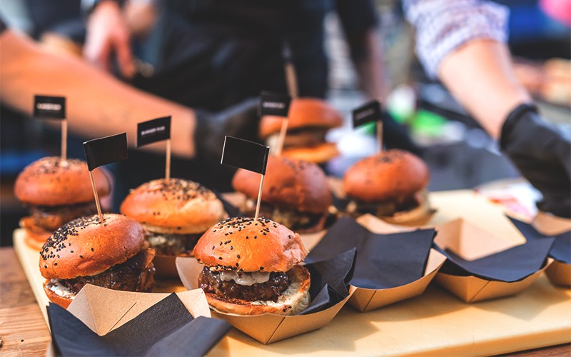 burgers on paper plate