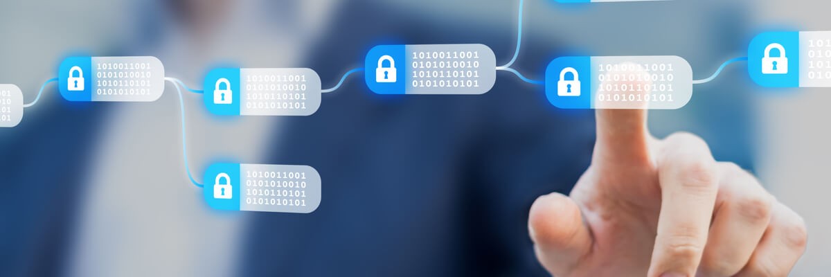 Businessman pointing at blockchain