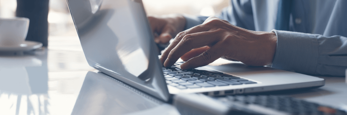 Business professional working on laptop computer