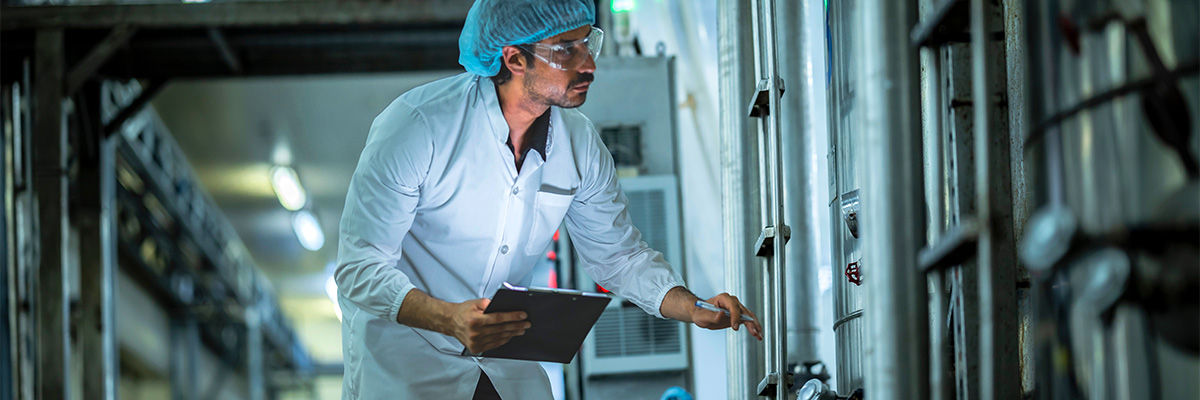 engineer inspecting with a tablet