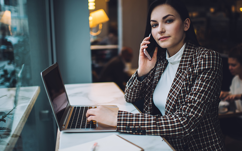 woman working beside window