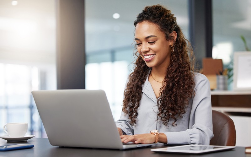 Women typing on laptop keyboards