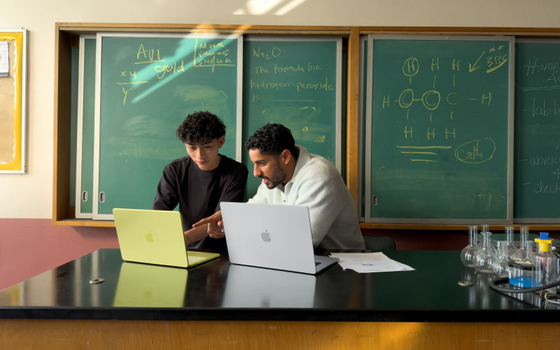 students using macbook neo