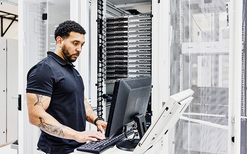 male working on data center