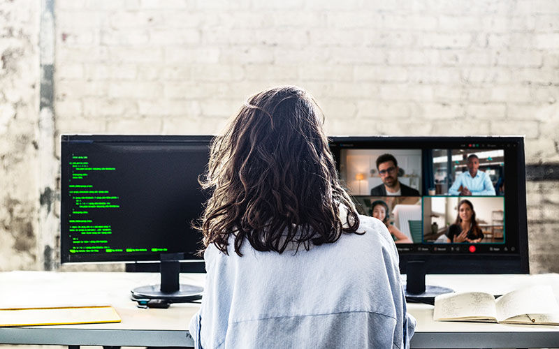 woman attending virtual meeting