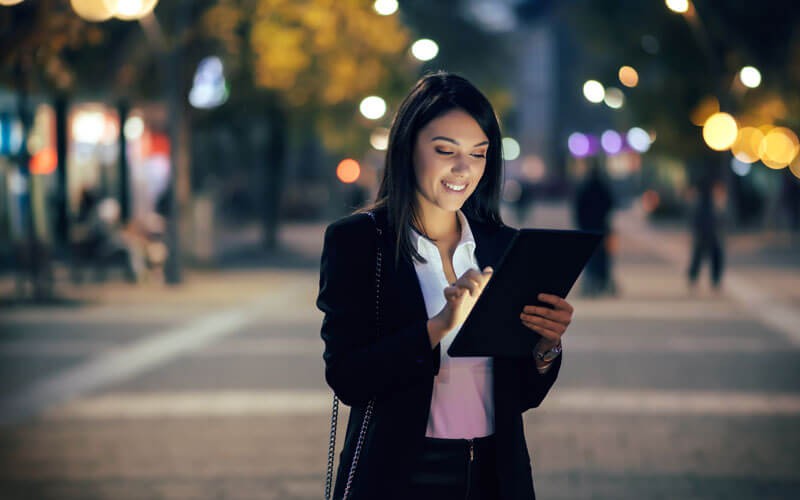 Access data anywhere Woman on tablet device remote