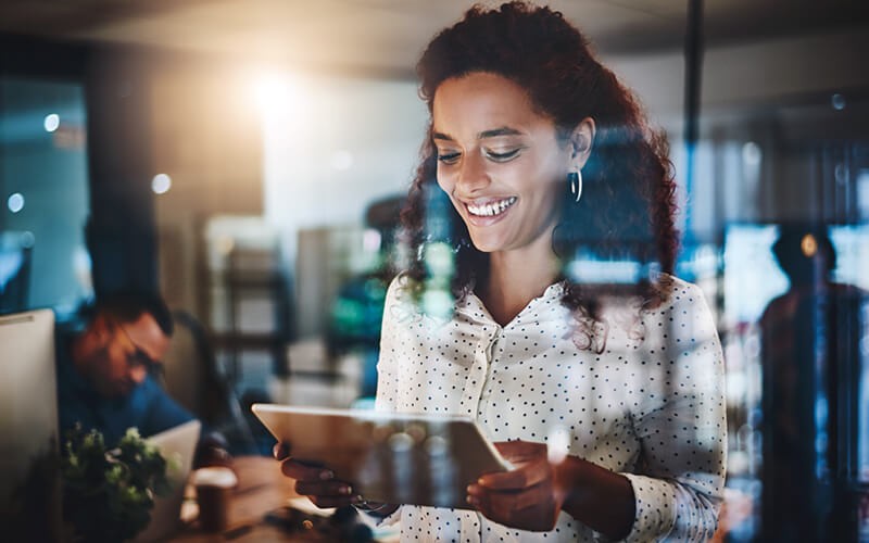 Woman holding tablet device