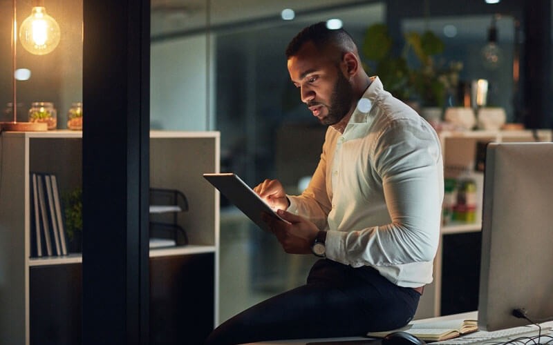 Businessman working on tablet