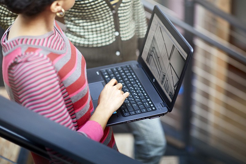 Lightweight, robust performance for anywhere you choose to work Woman uses a HP ZBook 14G2 Mobile Workstation.