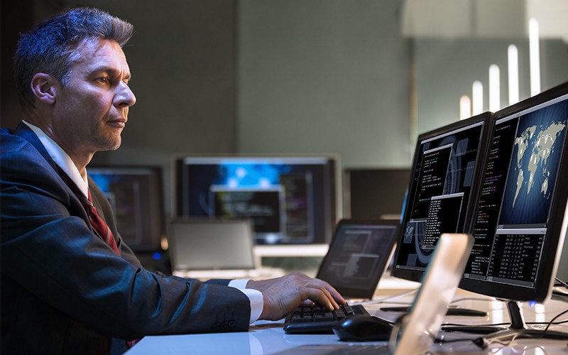 man using dual monitor