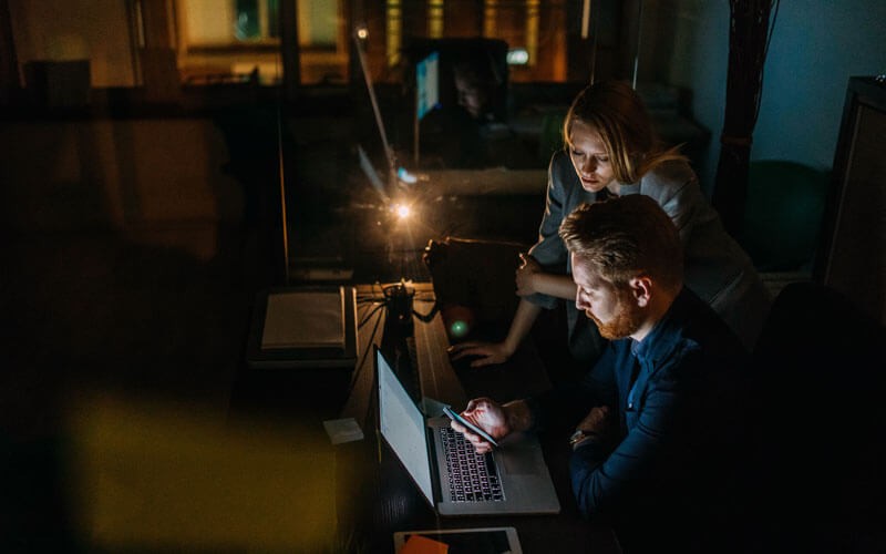 employees working in the dark