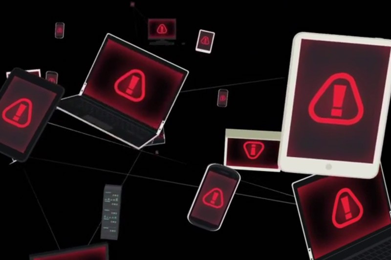 Abstract image of connected devices with warning symbols on the screen.
