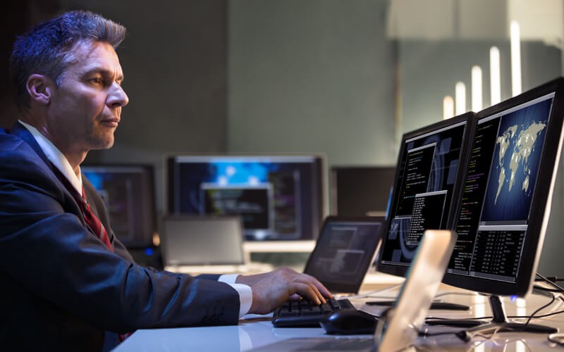Man on tablet utilizing cloud technology