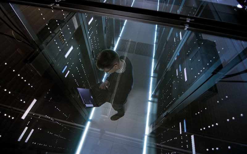 Man standing in data centre