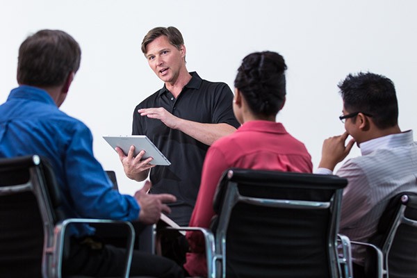 team-business-meeting-tablet-close-up-2