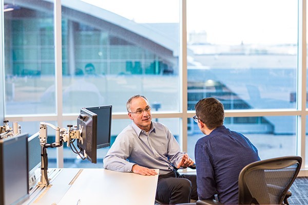 1440254326891 Man drawing design in front of computer