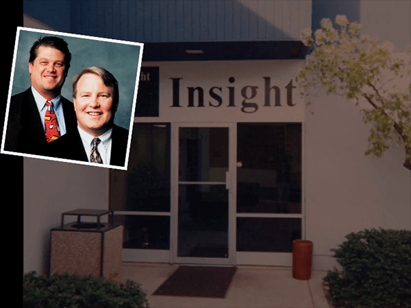 A picture of Insight's creators and a background of an old Insight office