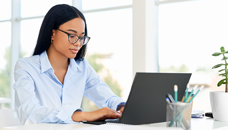 User working on Microsoft Surface Copilot device