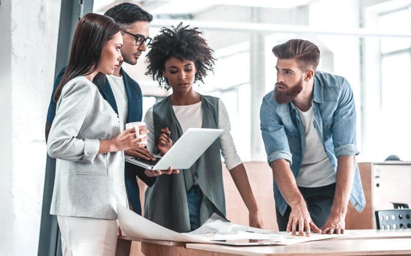 Business team discusses AWS cloud options