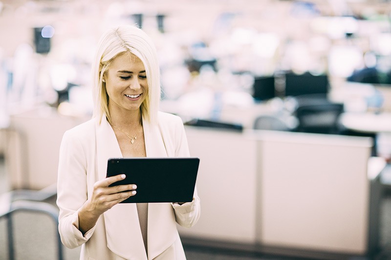 Business woman using tablet computer