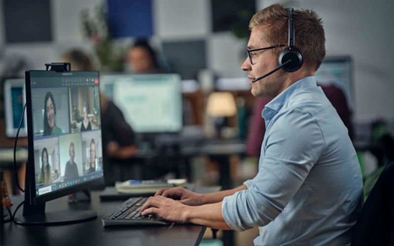 man using wireless headset