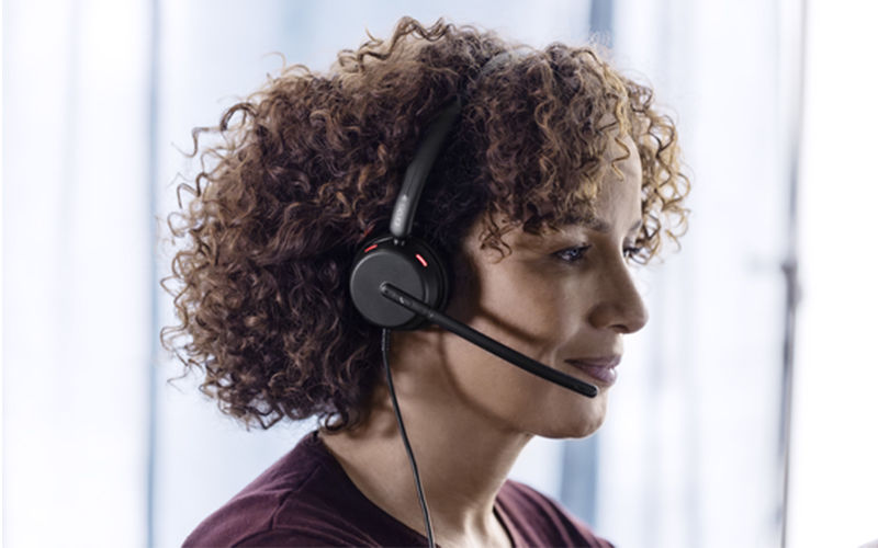 woman using corded headset