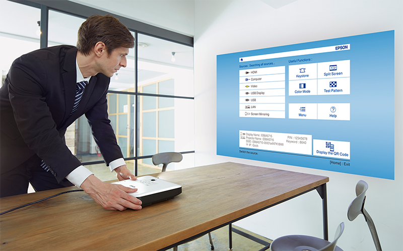 Epson projectors enhance communication and inspire collaboration Woman working at standing table with Epson projector