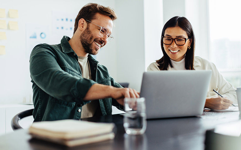 two-users-collaborating-at-laptop-is-1720565768