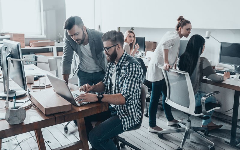 modern-open-office-with-employees-collaborating