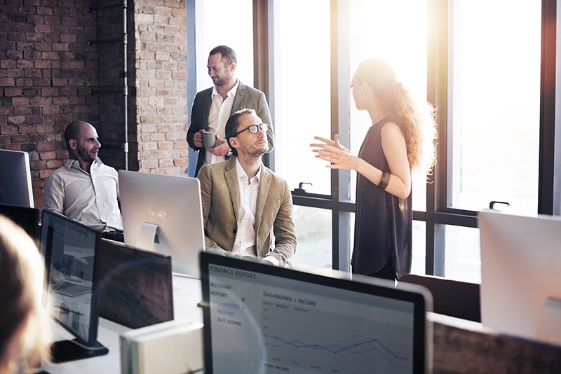 Provide computing power, storage and advanced networking solutions for your environment Team having a discussion around various computing devices