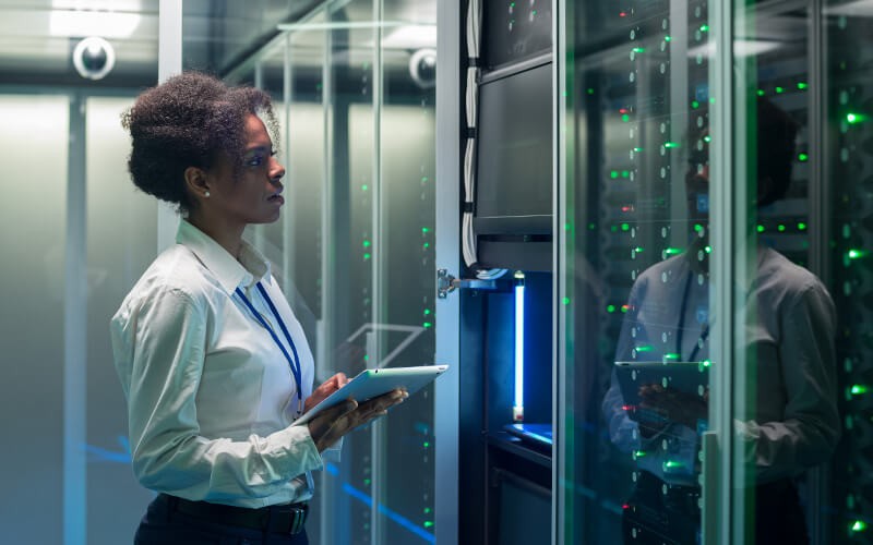 Woman working at the data center