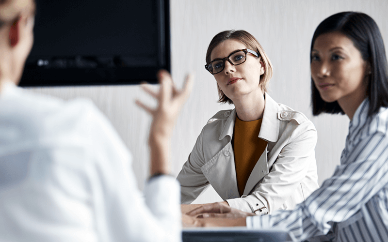 Business professionals gathered to discuss managed IT services