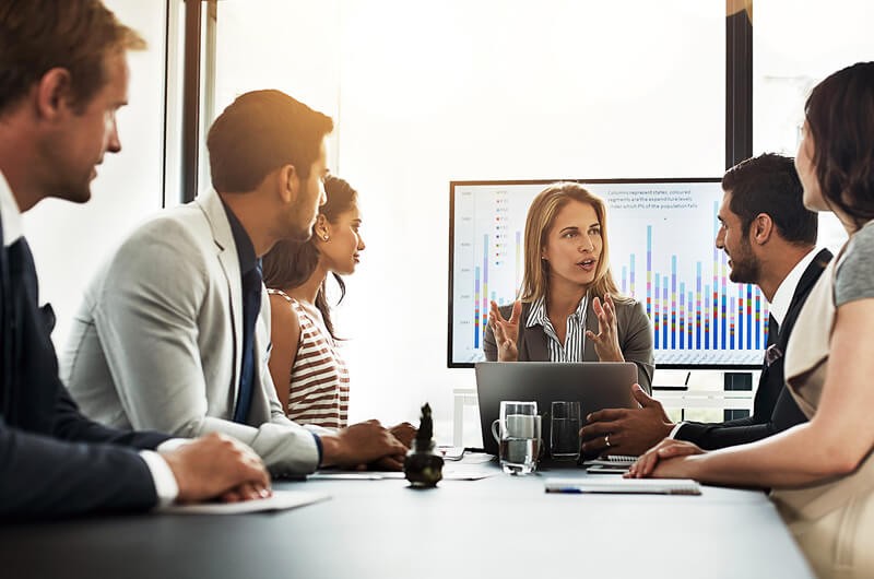 Local government officials access data remotely during team meeting