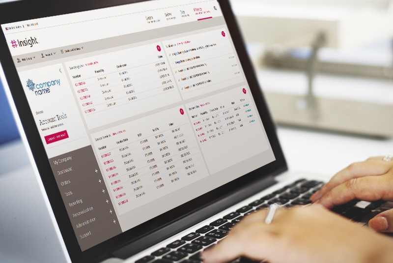 Insight's self-service e-commerce portal dashboard displayed on notebook computer