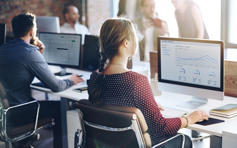 Business professional analyzes data